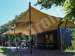 Vous pouvez faire connecter votre tente stretch à votre bâtiment