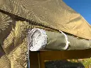 Zijwand met oprolbare deur
