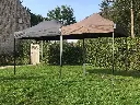 Vouwtent 2x3 zwart en 2x2 bruin Solid 30 opengezet in de tuin